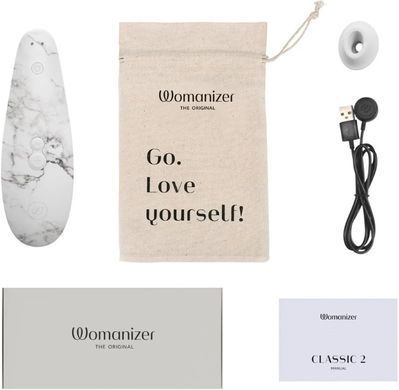 Вакуумний стимулятор Womanizer Marilyn Monroe (White Marble​) 400861 фото